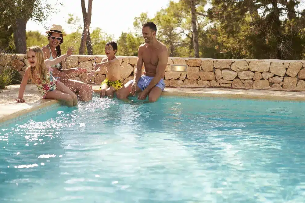 photo of a family in a low-energy swimming pool